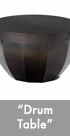 Thumbnail image of a bronze circular drum shaped table.