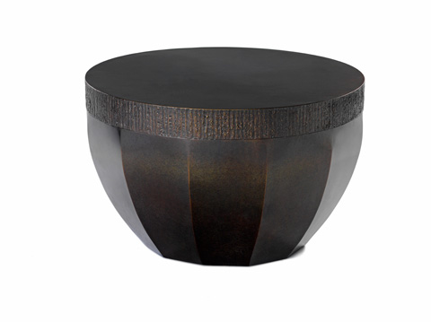 Image of a bronze circular drum shaped table.