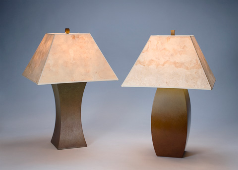 Image of three bronze table lamps.