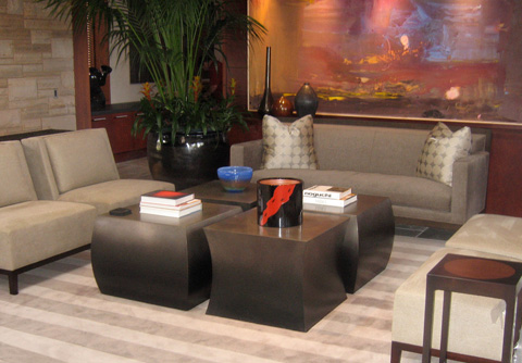 Image of four custom bronze tables.