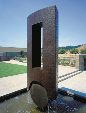 Image of large bronze water feature.