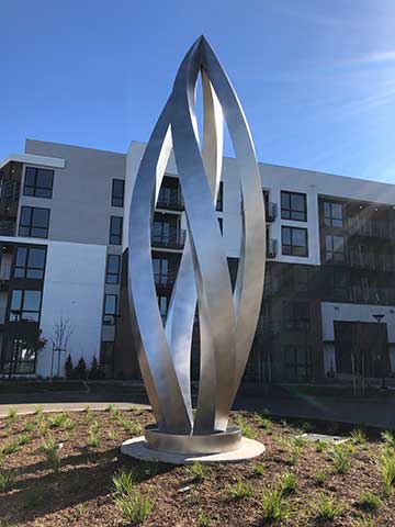 Image of a large stanless steel sculpture.