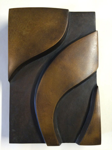 Image of a bronze wall sculpture.