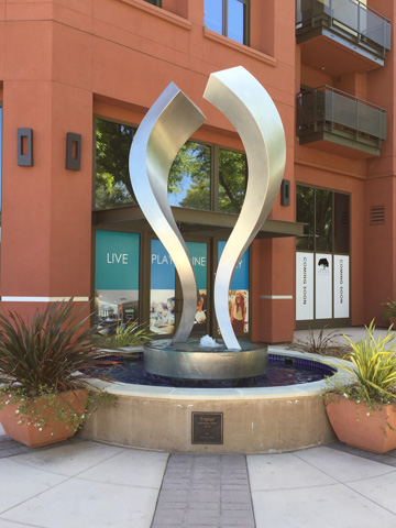 Image of a large stainless steel water feature.