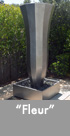 Thumbnail image of a large stainless steel water feature.
