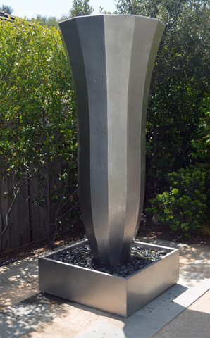 Image of a large stainless steel water feature.