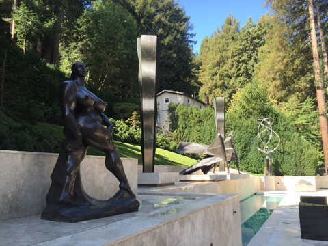 Image of a large bronze & stainless steel water feature.