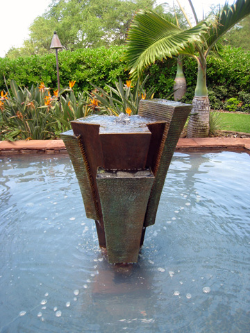 Image of a bronze water feature.