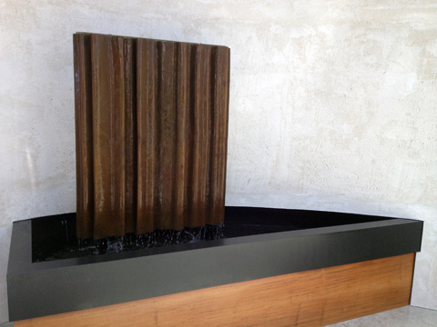 Image of a bronze water feature.
